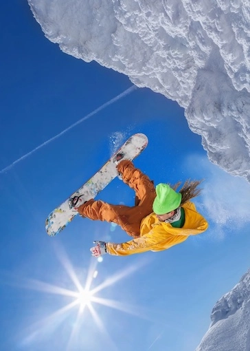 inverted snowboarder